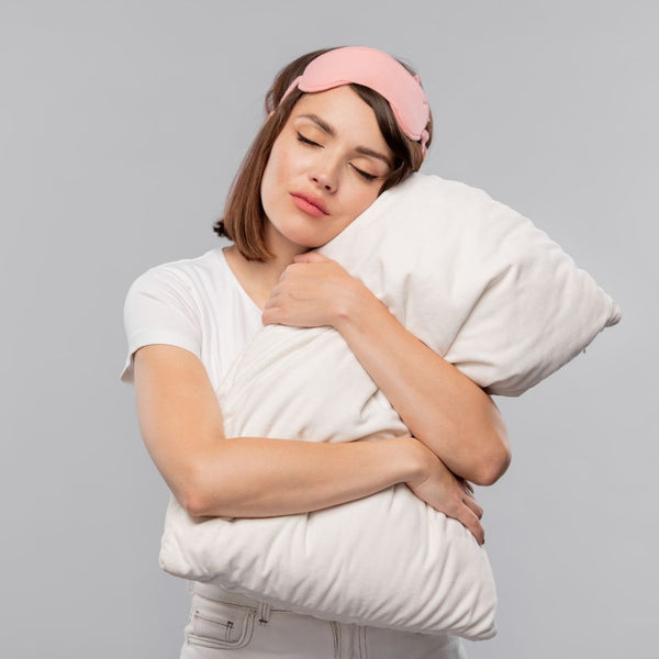Woman holding replacement pillow