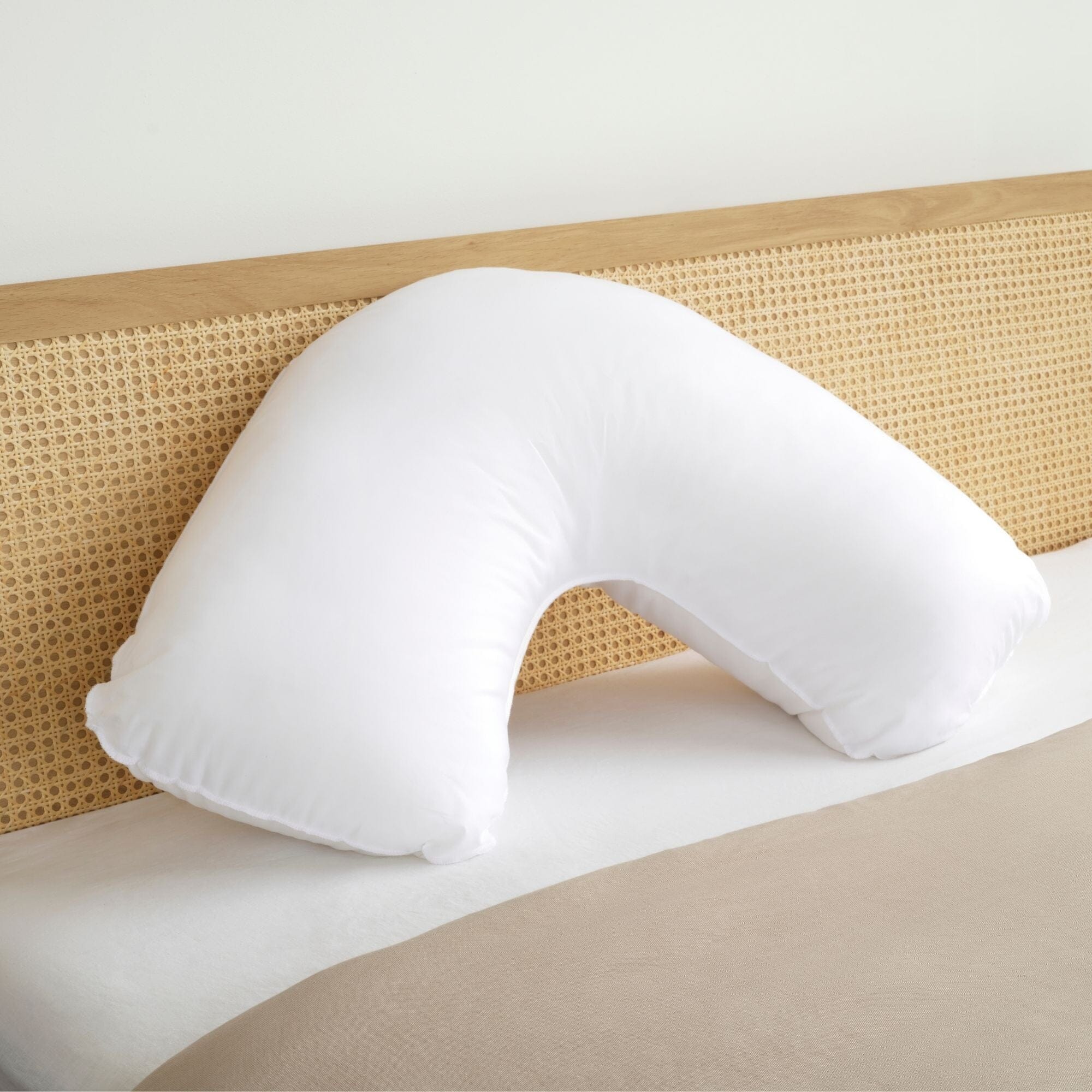 Boomerang Pillow on bed